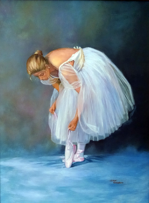 Ballerina tying laces